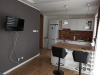 Kuchyňa alebo kuchynka v ubytovaní Apartament Słoneczne Giżycko