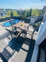 Bazén v ubytovaní Apartamenty Różany Ogród alebo v jeho blízkosti