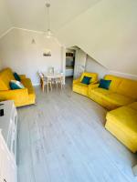 Posedenie v ubytovaní Apartamenty Różany Ogród
