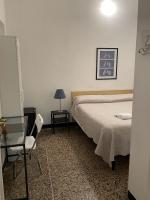 Posteľ alebo postele v izbe v ubytovaní Albergo Novecento