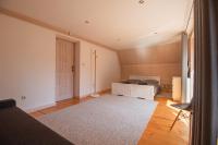 Posteľ alebo postele v izbe v ubytovaní Apartamenty nad Potokiem