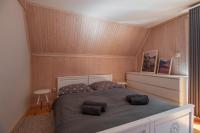 Posteľ alebo postele v izbe v ubytovaní Apartamenty nad Potokiem