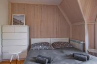 Posteľ alebo postele v izbe v ubytovaní Apartamenty nad Potokiem