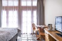 Televízia a/alebo spoločenská miestnosť v ubytovaní Hotel Sabała