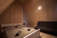 Posteľ alebo postele v izbe v ubytovaní Apartamenty nad Potokiem