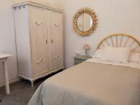 A bed or beds in a room at Piso modernista en casco histórico con garaje