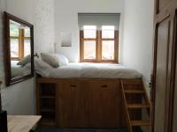 A bed or beds in a room at Piso modernista en casco histórico con garaje