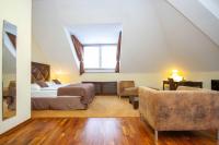 Łóżko lub łóżka w pokoju w obiekcie SKARITZ Hotel & Residence