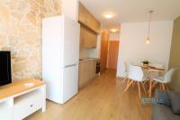 A kitchen or kitchenette at New Loft internacional , climatizado con piscina y playa.