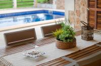 The swimming pool at or close to YourHouse Can Cuixa Villa