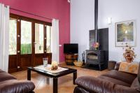 A television and/or entertainment centre at YourHouse Can Cuixa Villa