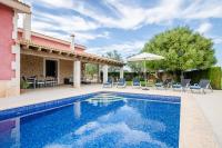 The swimming pool at or close to YourHouse Can Cuixa Villa