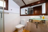 A bathroom at YourHouse Can Cuixa Villa