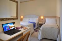 Posteľ alebo postele v izbe v ubytovaní Hotel Gaston