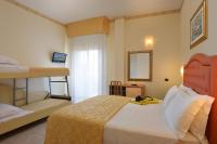Posteľ alebo postele v izbe v ubytovaní Hotel Gaston