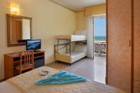 Posteľ alebo postele v izbe v ubytovaní Hotel Gaston