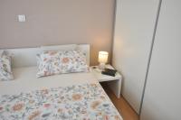 Posteľ alebo postele v izbe v ubytovaní Apartment Carmen, Žnjan, Split