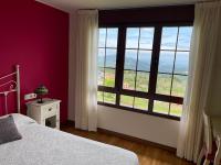 Postel nebo postele na pokoji v ubytování LA CASONA DE RALES VILLAVICIOSA