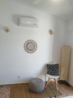 Posezení v ubytování Melanos Residence 2 bdrm townhouse with private pool