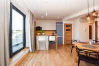 Kuchyňa alebo kuchynka v ubytovaní Apartamenty nad Wisłą