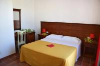Postel nebo postele na pokoji v ubytování Favignana Casa Vacanza Orsola