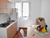 Kuchyň nebo kuchyňský kout v ubytování Favignana Casa Vacanza Orsola