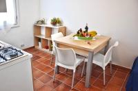 Kuchyň nebo kuchyňský kout v ubytování Favignana Casa Vacanza Orsola