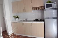 Kuchyň nebo kuchyňský kout v ubytování Favignana Casa Vacanza Orsola
