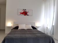 Posteľ alebo postele v izbe v ubytovaní B&B Bell'aria