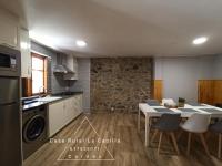 A kitchen or kitchenette at LA CAPILLA