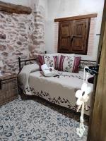Postel nebo postele na pokoji v ubytování Casa Rural "El Olivo"
