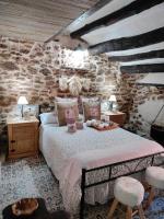 Postel nebo postele na pokoji v ubytování Casa Rural "El Olivo"