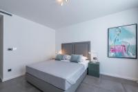 Posteľ alebo postele v izbe v ubytovaní Villa Sol del Mar III