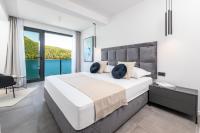 Posteľ alebo postele v izbe v ubytovaní Villa Sol del Mar III