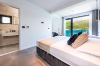 Posteľ alebo postele v izbe v ubytovaní Villa Sol del Mar III