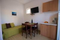Kuchyň nebo kuchyňský kout v ubytování SEA VIEW APARTMENT with big terrace / 2 rooms
