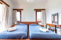 Postel nebo postele na pokoji v ubytování Seafront Villa Ocean Pearl - Private Beach Area & Pool