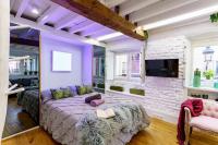 A bed or beds in a room at My Granada Garden - Catedral Lux Suite