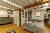 A bed or beds in a room at My Granada Garden - Catedral Lux Suite