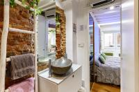 A bed or beds in a room at My Granada Garden - Catedral Lux Suite