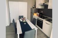 A kitchen or kitchenette at Loft Orlando 52