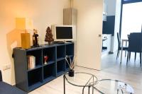 A television and/or entertainment centre at Loft Orlando 52