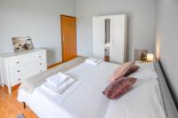 Postel nebo postele na pokoji v ubytování Apartment Albatros