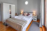 Postel nebo postele na pokoji v ubytování Apartment Albatros