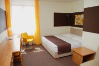 Postel nebo postele na pokoji v ubytování Hotel VZ Bedřichov