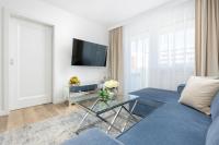 TV a/nebo společenská místnost v ubytování Baltini Premium Apartament Bliżej Morza