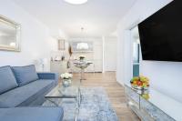 TV a/nebo společenská místnost v ubytování Baltini Premium Apartament Bliżej Morza