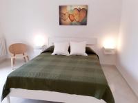 Posteľ alebo postele v izbe v ubytovaní B&B Bell'aria