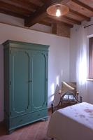 Łóżko lub łóżka w pokoju w obiekcie Agriturismo Podere Il Sorbo