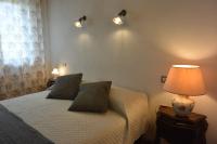 Łóżko lub łóżka w pokoju w obiekcie Agriturismo Podere Il Sorbo